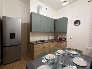 Kuchyň nebo kuchyňský kout v ubytování Historic residence - Center of Cividale & parking