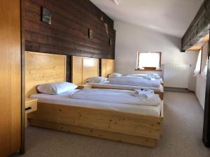 Postel nebo postele na pokoji v ubytování Hotel Sonnleiten