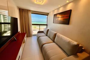 Et tv og/eller underholdning på VISTA MAR Encantadora Conforto e Estilo