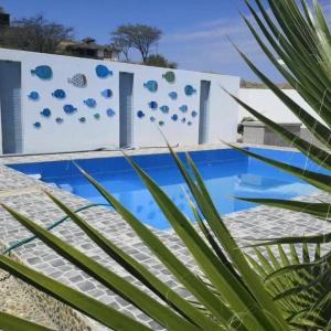 Бассейн в Residencia playa Punta Veleros или поблизости