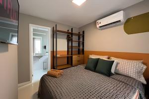 En eller flere senge i et værelse på Espetacular Praia 24HRS [LUXO]