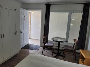 Postel nebo postele na pokoji v ubytování Hébergements ASLC Baie-Comeau