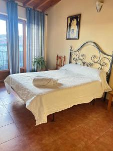 Postel nebo postele na pokoji v ubytování Casa Rural "Corral del Toro"