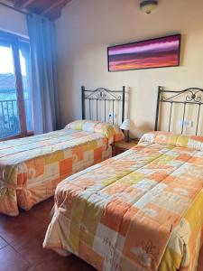 Postel nebo postele na pokoji v ubytování Casa Rural "Corral del Toro"