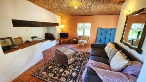 TV a/nebo společenská místnost v ubytování Little Eden Robertson