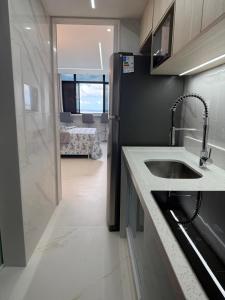 Kuchyň nebo kuchyňský kout v ubytování Sol Vitória Marina