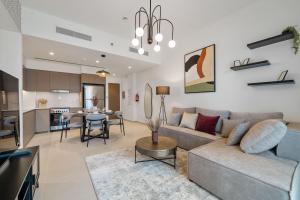 Kuchyň nebo kuchyňský kout v ubytování One Lux Stay Grande Signature Residences