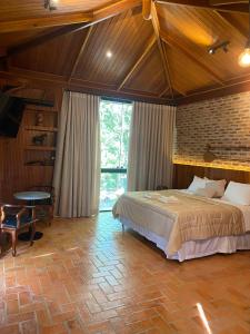 En eller flere senge i et værelse på Hotel Fazenda Igarapés + 69 billeder