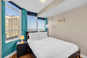 En eller flere senge i et værelse på 2 bedroom spacious apartment in Mississauga