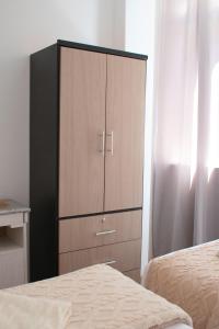 En eller flere senge i et værelse på Apart Hotel Alojate Kaypi