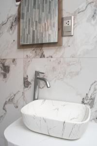 Et badeværelse på Apart Hotel Alojate Kaypi