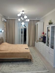 En eller flere senge i et værelse på Apartament ultracentru