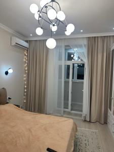 En eller flere senge i et værelse på Apartament ultracentru