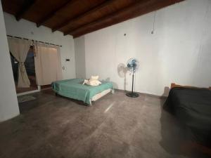 En eller flere senge i et værelse på Quinta Los Barrera