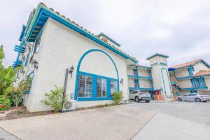a building with a blue and white at Hotel Avenida, San Clemente Beach in San Clemente