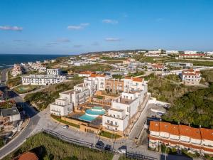 an aerial view of a city with buildings and the ocean at FozPanoramic in Foz do Arelho