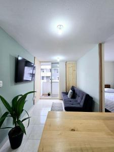 TV a/nebo společenská místnost v ubytování Más de 30 Apartamentos Privados en el Quindío con PISCINA