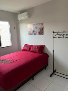 En eller flere senge i et værelse på Apartamento térreo em condomínio 24 hrs + 10 billeder