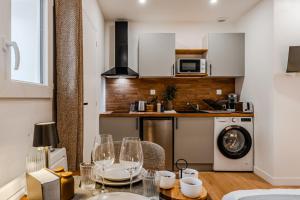 Køkken eller tekøkken på Suite d'Exception sous Voûtes avec Spa & Cinéma + 19 billeder