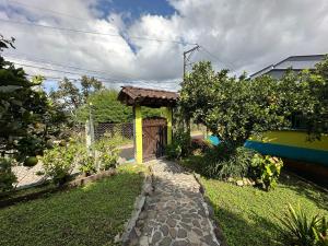 En have udenfor Melongos Jardín