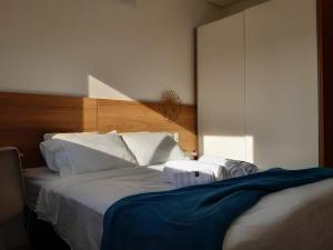 Postel nebo postele na pokoji v ubytování Apartamento completo Centro Garopaba