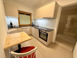 Kuchyň nebo kuchyňský kout v ubytování Bergnest Appartements