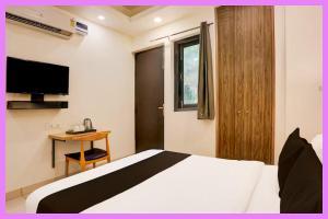 Et tv og/eller underholdning på Hotel Noble Stay Near APJ Park