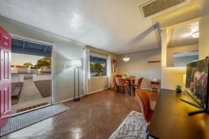 a living room with a table and a dining room at Santa Rita Primary (Mike Morgan) in Tucson