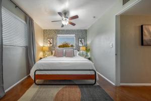 a bedroom with a bed and a ceiling fan at Santa Rita Primary (Mike Morgan) in Tucson