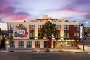 a building with a sign on the side of it at Aiden by Best Western Berkeley in Berkeley