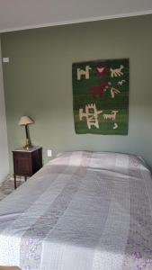 En eller flere senge i et værelse på Los Caniches Concepcion del uruguay