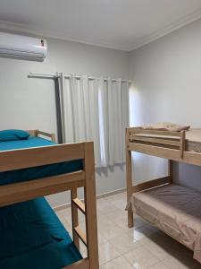 Ένα ή περισσότερα κρεβάτια σε δωμάτιο στο euro amazon