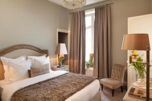 Ένα ή περισσότερα κρεβάτια σε δωμάτιο στο Château de la Marine +29 φωτογραφίες