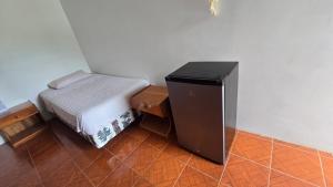 En eller flere senge i et værelse på Habitación Almar