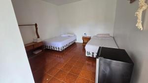 En eller flere senge i et værelse på Habitación Almar