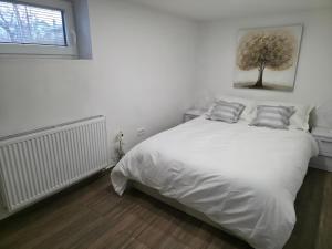 Postel nebo postele na pokoji v ubytování Guesthouse Flower