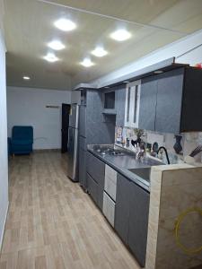 Kuchyň nebo kuchyňský kout v ubytování Relax Inhouse