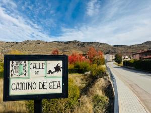 a sign on the side of a road at El Sueño de Albarracin III in Albarracín +5 photos