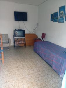 TV a/nebo společenská místnost v ubytování Lo de Susi