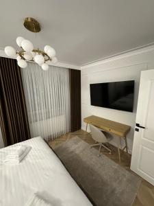 Et tv og/eller underholdning på Central Apartment Luxury Suceava