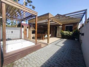 Ảnh trong thư viện ảnh của Casa Com 2 Jacuzzis Entre Mariscal E Canto Grande ở Bombinhas
