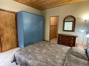 En eller flere senge i et værelse på Montaria Suite