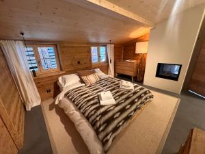 Postel nebo postele na pokoji v ubytování Luxury family Chalet with extraordinary Mountain views