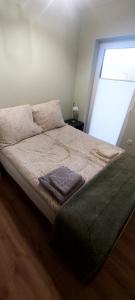 Postel nebo postele na pokoji v ubytování Domek pod Gorcami