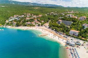 an aerial view of a beach in a resort at House House Jadranovo in Jadranovo