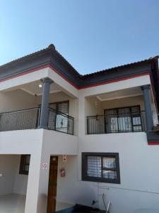 En balkon eller terrasse på Amai Guesthouse