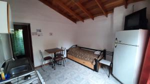 TV a/nebo společenská místnost v ubytování Hosteria Arture