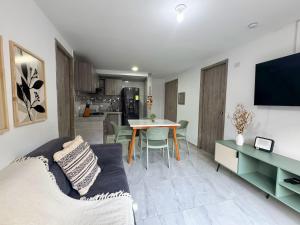 Et tv og/eller underholdning på Apto moderno con AC y Excelente Ubicacion