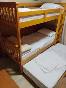 En eller flere senge i et værelse på Chácara Alci Guedes + 30 billeder