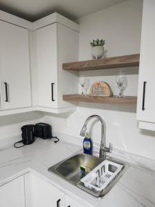 Køkken eller tekøkken på Oasis Haven + 5 billeder